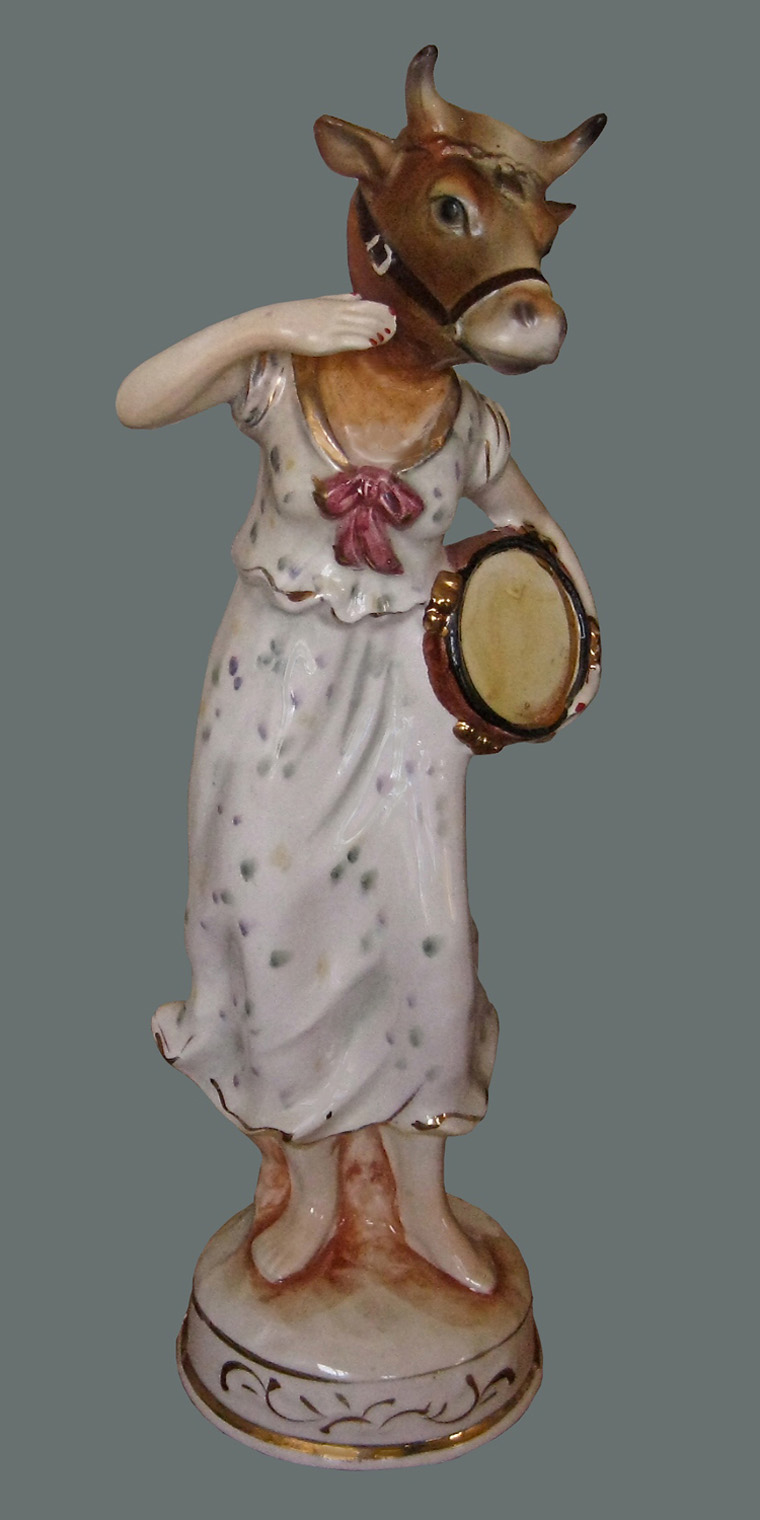 Click Mort, Cow Playing a Tambourine