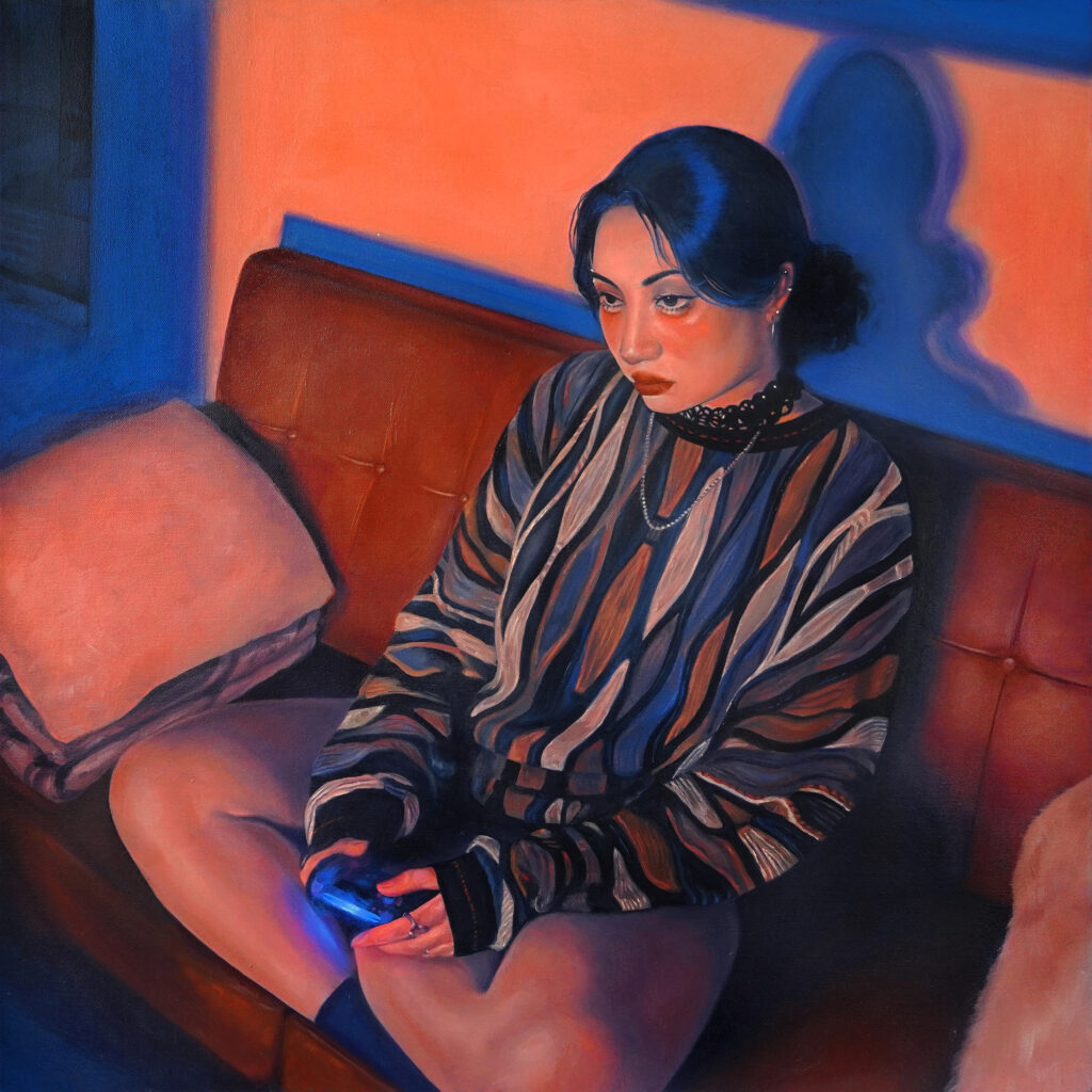 oil painting by jesse zuo of an asian woman in a vintage 90's style cable knit sweater playing video games on a couch in a dark blue room lit by an orange screen