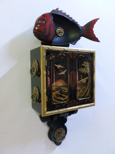 Japanese cabinetry and fish assemblage sculpture