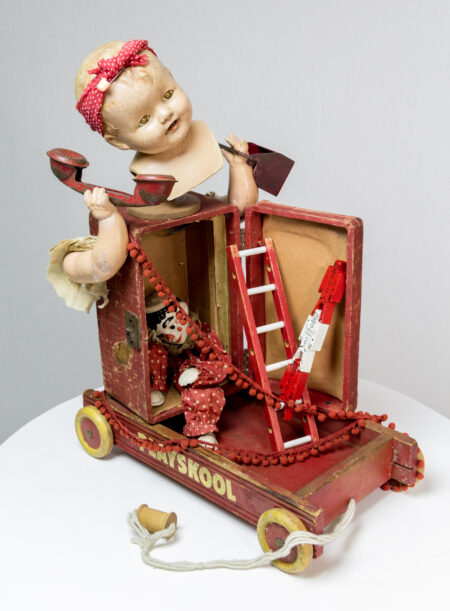 toy wagon cart with upright chest containing Clippo the clown puppet; mini ladder, baby doll parts and antique play telephone