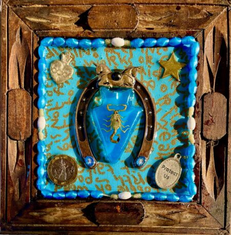 scorpion in resin, blue and gold embellishments inside wooden frame
