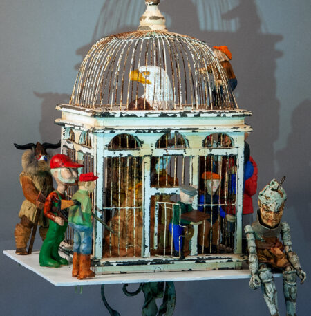 poetic depiction of insurrection, eagle trapped in cage